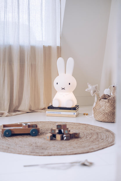 Lifestyle photo of Miffy Star Light in a living room corner