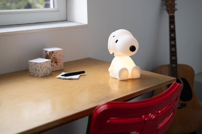 Snoopy First Light glowing softly on a desk
