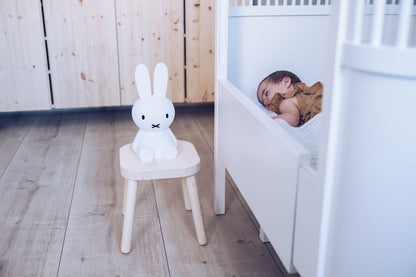 Miffy First Light wireless night lamp sitting in the nursery room